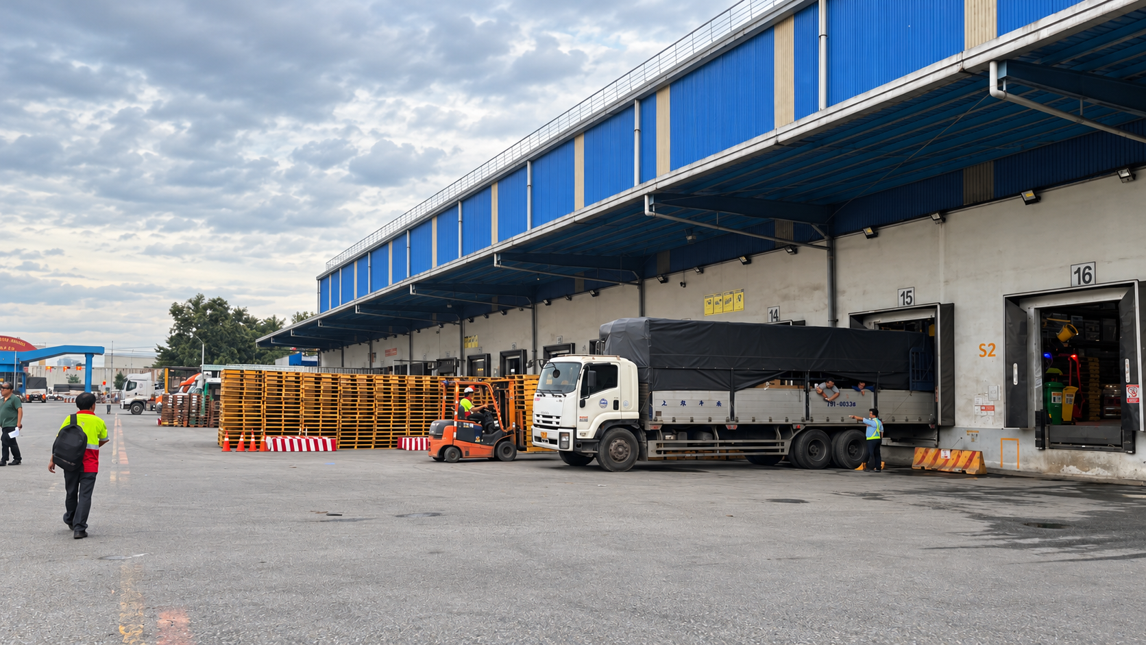 Tuan Trinh Logistics truck at warehouse facility
